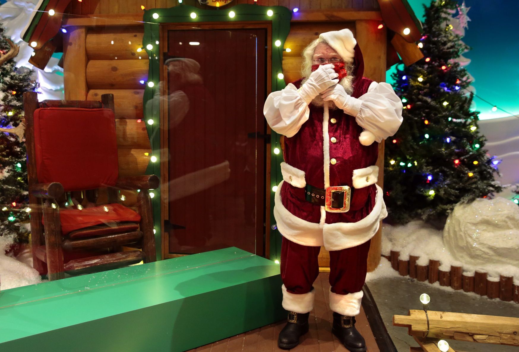 Sanitized Santa appears behind the glass